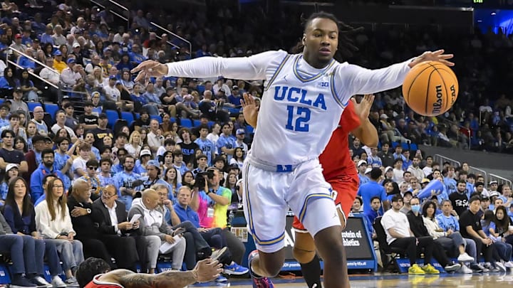 Feb 23, 2025; Los Angeles, California, USA; UCLA Bruins guard Sebastian Mack (12) chases a loose ball past Ohio State Buckeyes guard Ques Glover (6) during the second half at Pauley Pavilion presented by Wescom. Mandatory Credit: Robert Hanashiro-Imagn Images Feb 23, 2025; Los Angeles, California, USA; UCLA Bruins guard Sebastian Mack (12) chases a loose ball past Ohio State Buckeyes guard Ques Glover (6) during the second half at Pauley Pavilion presented by Wescom. Mandatory Credit: Robert Hanashiro-Imagn Images