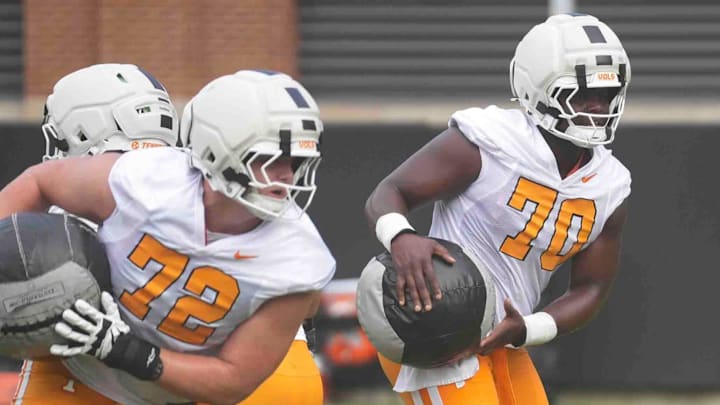 Tennessee offensive lineman David Sanders Jr. (70) and Tennessee offensive lineman Jesse Perry (72) during Tennessee football preseason practice, in Knoxville, Tennessee, July 31, 2025.