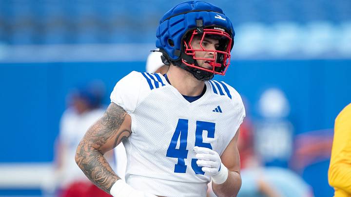 Kansas redshirt freshman defensive end Garrett Martin (45) runs during a drill during practice at Kivisto Field inside David Booth Kansas Memorial Stadium on Aug. 14, 2026. Kansas redshirt freshman defensive end Garrett Martin (45) runs during a drill during practice at Kivisto Field inside David Booth Kansas Memorial Stadium on Aug. 14, 2026.