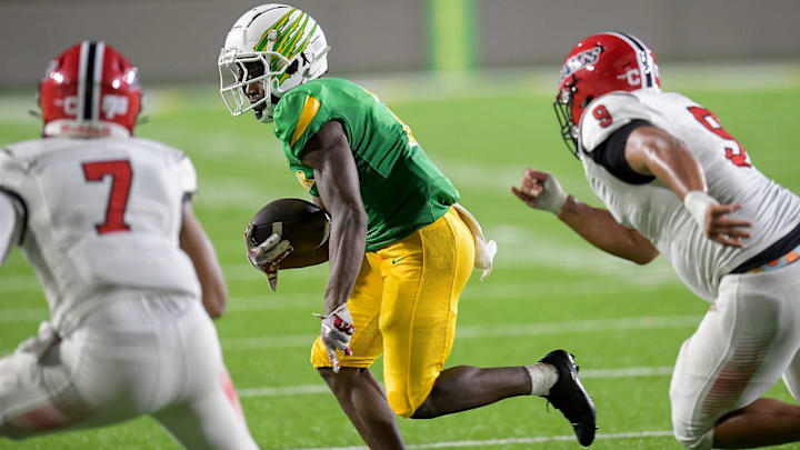 Carver's Anthony Rogers (2) carries the ball against Opelika during their game at Cramton Bowl in Montgomery, Ala., on Thursday October 24, 2024. Carver's Anthony Rogers (2) carries the ball against Opelika during their game at Cramton Bowl in Montgomery, Ala., on Thursday October 24, 2024.