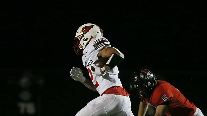 Newton's Isaiah Hansen (2) runs for a touchdown around Gilbert's safety Alden Short (5) during first quarter at Tigers Stadium on Friday, Oct. 18, 2024, in Gilbert, Iowa Newton's Isaiah Hansen (2) runs for a touchdown around Gilbert's safety Alden Short (5) during first quarter at Tigers Stadium on Friday, Oct. 18, 2024, in Gilbert, Iowa