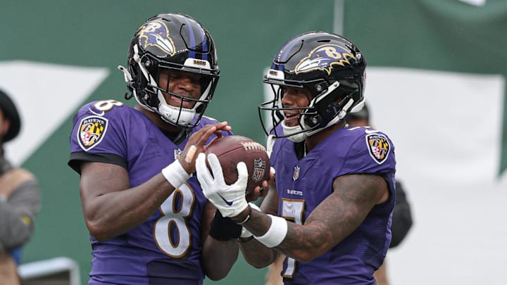 Sep 11, 2022; East Rutherford, New Jersey, USA; Baltimore Ravens quarterback Lamar Jackson (8) celebrates with wide receiver Rashod Bateman (7) during the second half against the New York Jets at MetLife Stadium. Mandatory Credit: Vincent Carchietta-Imagn Images Sep 11, 2022; East Rutherford, New Jersey, USA; Baltimore Ravens quarterback Lamar Jackson (8) celebrates with wide receiver Rashod Bateman (7) during the second half against the New York Jets at MetLife Stadium. Mandatory Credit: Vincent Carchietta-Imagn Images