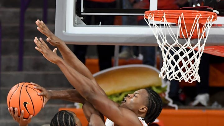 Clemson Tigers forward RJ Godfrey (0) defends the shot of Morehead State Eagles guard George Marshall (3) Tuesday, Nov. 11, 2025, during the NCAA men’s basketball game at Littlejohn Coliseum in Clemson, South Carolina. Clemson Tigers won 83-56. Clemson Tigers forward RJ Godfrey (0) defends the shot of Morehead State Eagles guard George Marshall (3) Tuesday, Nov. 11, 2025, during the NCAA men’s basketball game at Littlejohn Coliseum in Clemson, South Carolina. Clemson Tigers won 83-56.