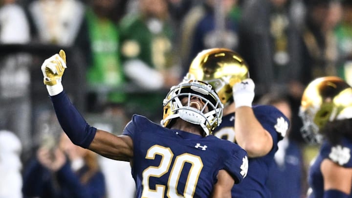 Oct 14, 2023; South Bend, Indiana, USA; Notre Dame Fighting Irish cornerback Benjamin Morrison (20) celebrates after an interception in the second quarter against the USC Trojans at Notre Dame Stadium. Mandatory Credit: Matt Cashore-Imagn Images Oct 14, 2023; South Bend, Indiana, USA; Notre Dame Fighting Irish cornerback Benjamin Morrison (20) celebrates after an interception in the second quarter against the USC Trojans at Notre Dame Stadium. Mandatory Credit: Matt Cashore-Imagn Images