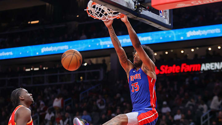 Dec 18, 2023; Atlanta, Georgia, USA; Detroit Pistons forward Marvin Bagley III (35) dunks against the Atlanta Hawks in the second half at State Farm Arena. Mandatory Credit: Brett Davis-Imagn Images