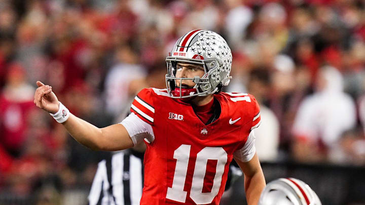 Ohio State Buckeyes quarterback Julian Sayin (10) speaks to his teammates in the second half of the NCAA college football game at Ohio Stadium on Saturday, Nov. 15, 2025 in Columbus, Ohio.