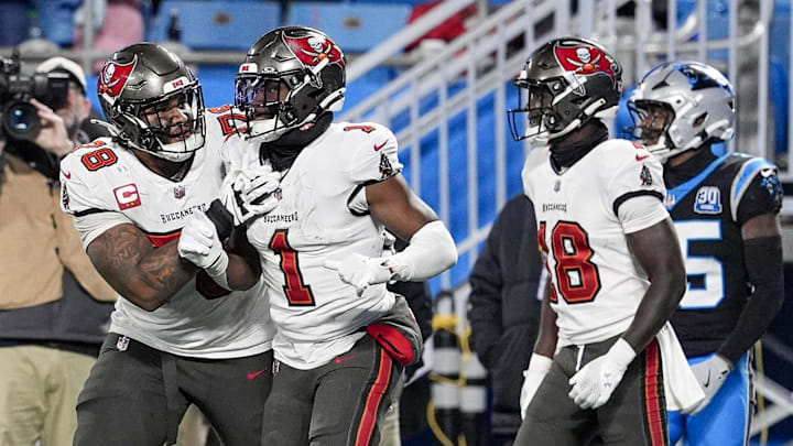 Dec 1, 2024; Charlotte, North Carolina, USA; Tampa Bay Buccaneers offensive tackle Tristan Wirfs (78) celebrates a score by running back Rachaad White (1) during the second half against the Carolina Panthers at Bank of America Stadium. Mandatory Credit: Jim Dedmon-Imagn Images Dec 1, 2024; Charlotte, North Carolina, USA; Tampa Bay Buccaneers offensive tackle Tristan Wirfs (78) celebrates a score by running back Rachaad White (1) during the second half against the Carolina Panthers at Bank of America Stadium. Mandatory Credit: Jim Dedmon-Imagn Images