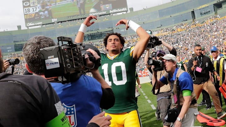 Green Bay Packers quarterback Jordan Love (10) celebrates his victory over the Saints in his first home start.