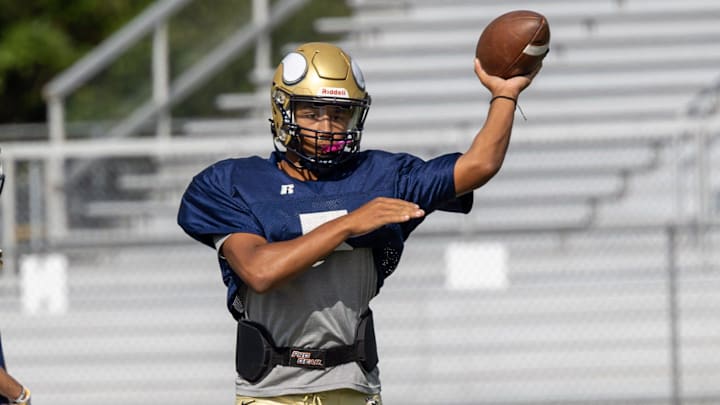 James Armstrong fires a pass downfield during Hopewell's practice on Aug. 20 at Tony Dorsett Stadium.