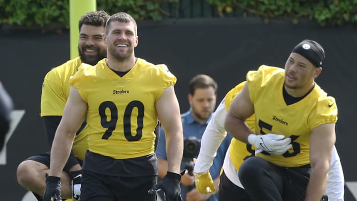 May 24, 2022; Pittsburgh, PA, USA;  Pittsburgh Steelers defensive end Cameron Hayward (rear) and linebackers  TJ Watt (90) and Alex Highsmith (56) participate in organized team activities at UPMC Rooney Sports Complex. Mandatory Credit: Charles LeClaire-Imagn Images