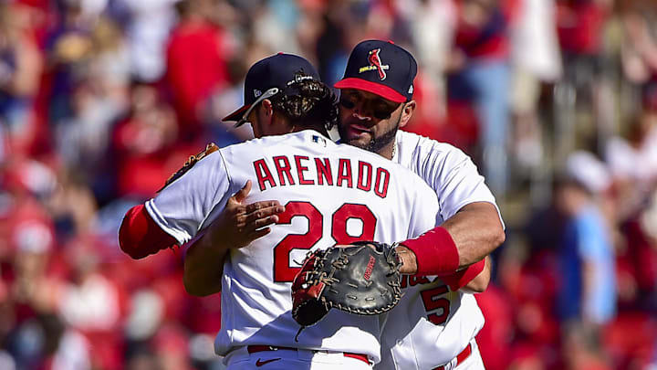 May 1, 2022; St. Louis, Missouri, USA;  St. Louis Cardinals first baseman Albert Pujols (5) celebrates with third baseman Nolan Arenado (28) after the Cardinals defeated the Arizona Diamondbacks at Busch Stadium. Mandatory Credit: Jeff Curry-Imagn Images