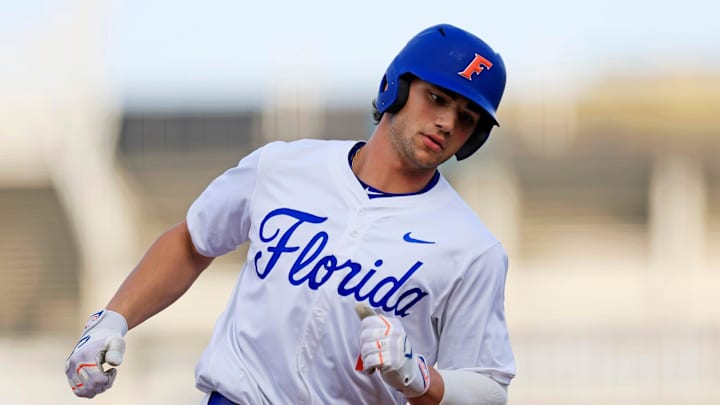 Florida utility Jac Caglianone (14) rounds third base after hitting a home run during the first inning of an NCAA baseball matchup at 121 Financial Ballpark in Jacksonville, Fla. Florida State defeated Florida 14-3.
