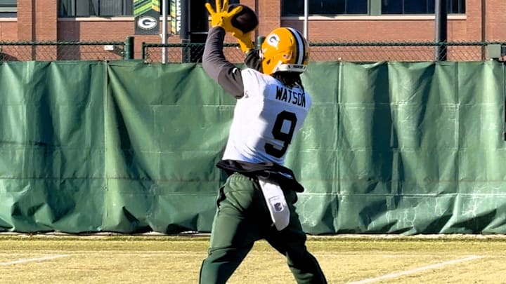 Christian Watson catches a pass at practice on Wednesday. Christian Watson catches a pass at practice on Wednesday.