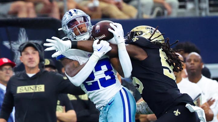 Sep 15, 2024; Arlington, Texas, USA; New Orleans Saints linebacker Demario Davis (56) defends a pass intended for Dallas Cowboys running back Rico Dowdle (23) during the first quarter at AT&T Stadium. Mandatory Credit: Kevin Jairaj-Imagn Images Sep 15, 2024; Arlington, Texas, USA; New Orleans Saints linebacker Demario Davis (56) defends a pass intended for Dallas Cowboys running back Rico Dowdle (23) during the first quarter at AT&T Stadium. Mandatory Credit: Kevin Jairaj-Imagn Images
