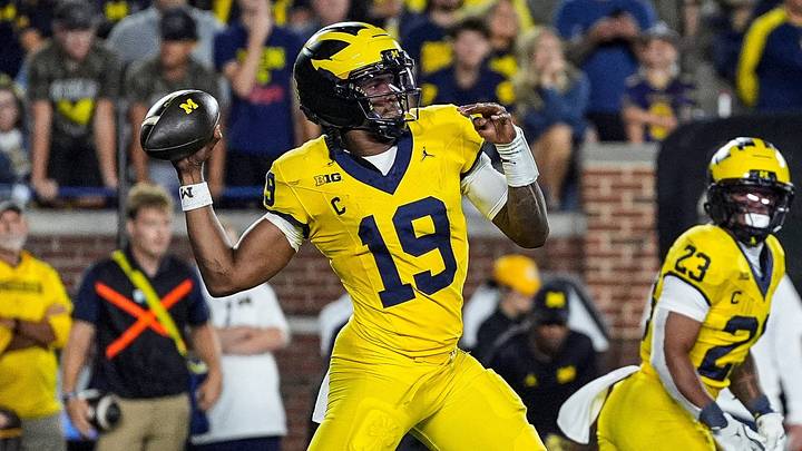 Michigan quarterback Bryce Underwood throws against Western Michigan on Saturday. The Wolverines were awarded one second at the end of the game which resulted in a winning Hail Mary TD throw.