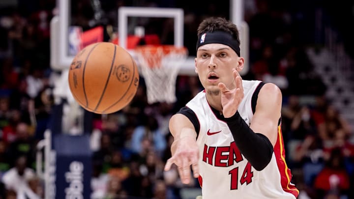 Feb 23, 2024; New Orleans, Louisiana, USA;  Miami Heat guard Tyler Herro (14) passes the ball - Stephen Lew/USA Today Sports
