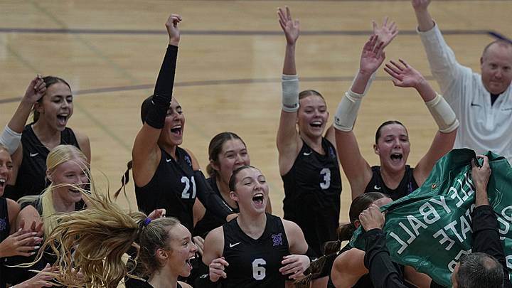 Norwalk volleyball team celebrates after winning 3-0. Against Ballard in the 4A-regional final on Oct. 28, 2025, in Norwalk, Iowa. Norwalk volleyball team celebrates after winning 3-0. Against Ballard in the 4A-regional final on Oct. 28, 2025, in Norwalk, Iowa.