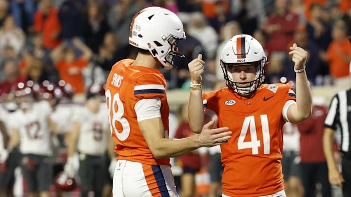 Oct 18, 2025; Charlottesville, Virginia, USA; Virginia Cavaliers kicker Will Bettridge (41) celebrates after making a game-tying field goal against the Washington State Cougars in the final minutes in the fourth quarter at Scott Stadium. Mandatory Credit: Geoff Burke-Imagn Images