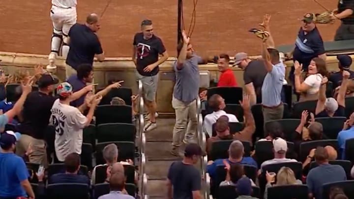 Everyone loves the fan who caught another fan’s hat after he caught a foul ball with that hat.