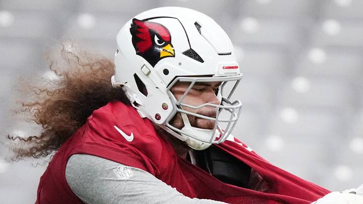 Arizona Cardinalsoffensive lineman Isaac Seumalo (73) blocks defensive lineman L.J. Collier (91) during training camp at State Farm Stadium in Glendale on July 26, 2026. Arizona Cardinalsoffensive lineman Isaac Seumalo (73) blocks defensive lineman L.J. Collier (91) during training camp at State Farm Stadium in Glendale on July 26, 2026.