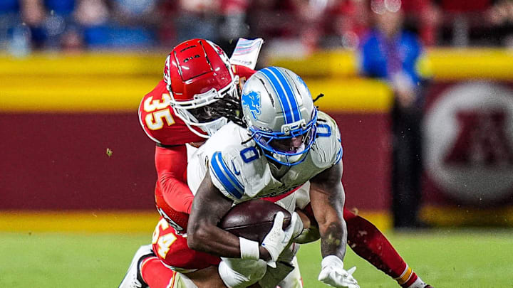 Detroit Lions running back Jahmyr Gibbs (0) runs against Kansas City Chiefs cornerback Jaylen Watson (35) during the second half at Arrowhead Stadium in Kansas City, Missouri on Sunday, Oct. 12, 2025. Detroit Lions running back Jahmyr Gibbs (0) runs against Kansas City Chiefs cornerback Jaylen Watson (35) during the second half at Arrowhead Stadium in Kansas City, Missouri on Sunday, Oct. 12, 2025.
