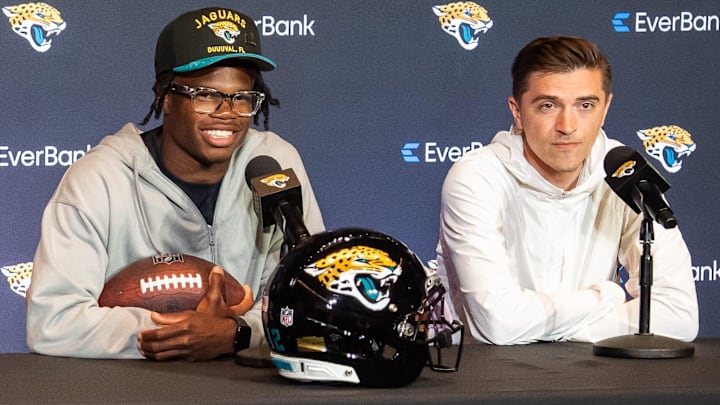 The Jacksonville Jaguars’ first-round pick, Colorado Buffaloes wide receiver and defensive back Travis Hunter, left, answers questions during a press conference Friday, March 25, 2025 at Miller Electric Center in Jacksonville, Fla. with General Manager James Gladstone, right. [Doug Engle/Florida Times-Union]