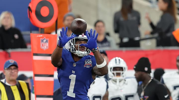 Sep 26, 2024; East Rutherford, New Jersey, USA; New York Giants wide receiver Malik Nabers (1) catches a pass against the Dallas Cowboys during the third quarter at MetLife Stadium. Mandatory Credit: Brad Penner-Imagn Images