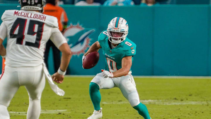 Miami Dolphins wide receiver Braxton Berrios (0) returns a punt during a preseason game at Hard Rock