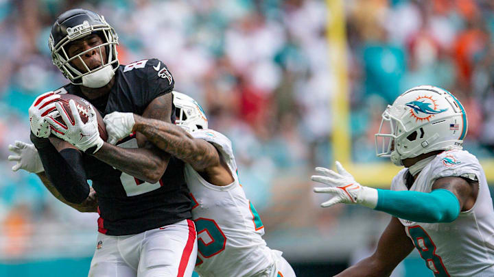 Atlanta Falcons tight end Kyle Pitts (8), makes a catch over Miami Dolphins cornerback Xavien Howard (25), late in the fourth quarter against the Miami Dolphins during NFL game at Hard Rock Stadium Sunday in Miami Gardens in 2021. Atlanta Falcons tight end Kyle Pitts (8), makes a catch over Miami Dolphins cornerback Xavien Howard (25), late in the fourth quarter against the Miami Dolphins during NFL game at Hard Rock Stadium Sunday in Miami Gardens in 2021.