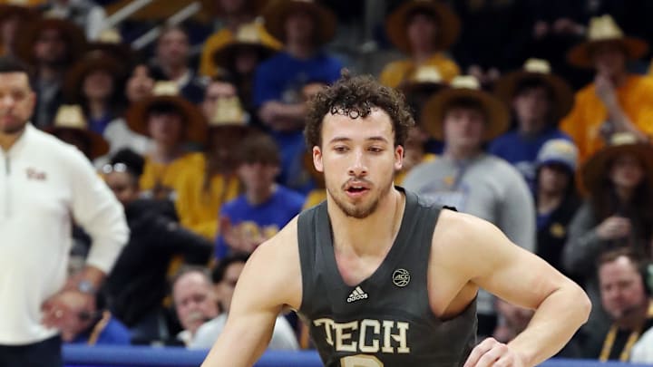Feb 25, 2025; Pittsburgh, Pennsylvania, USA;  Georgia Tech Yellow Jackets guard Lance Terry (0) dribbles against the Pittsburgh Panthers during the second half at the Petersen Events Center. Mandatory Credit: Charles LeClaire-Imagn Images