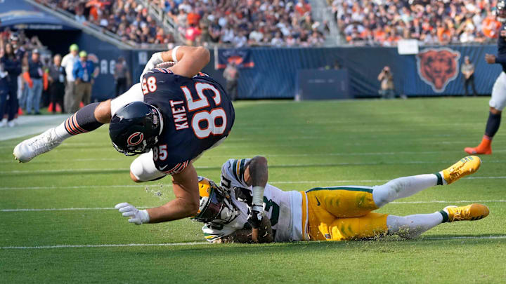 Cole Kmet is tripped up near the goal line by Jaire Alexander in last year's season-opening Bears loss at Soldier Field. Cole Kmet is tripped up near the goal line by Jaire Alexander in last year's season-opening Bears loss at Soldier Field.