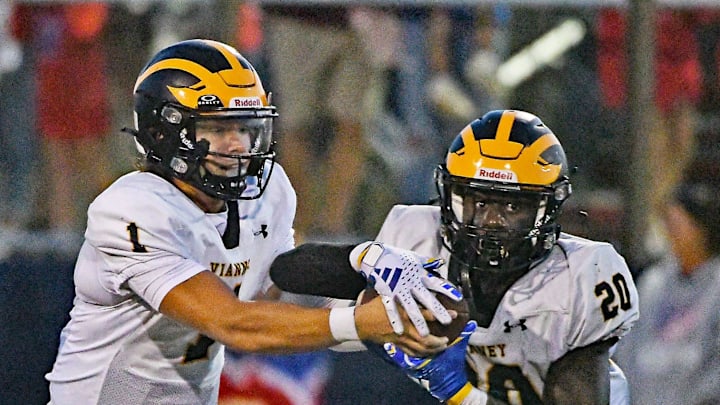 St John Vianney QB Zach Labarca hands off to Abdul Turay as Wall football defeats St. John Vianney 36-26 on 9/20/2024