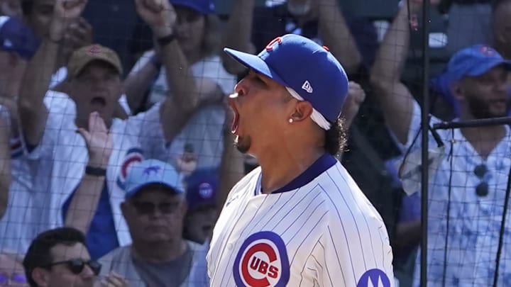 Jun 21, 2025; Chicago, Illinois, USA; Chicago Cubs pitcher Daniel Palencia (48) celebrates getting the final out against the Seattle Mariners during the ninth inning at Wrigley Field.