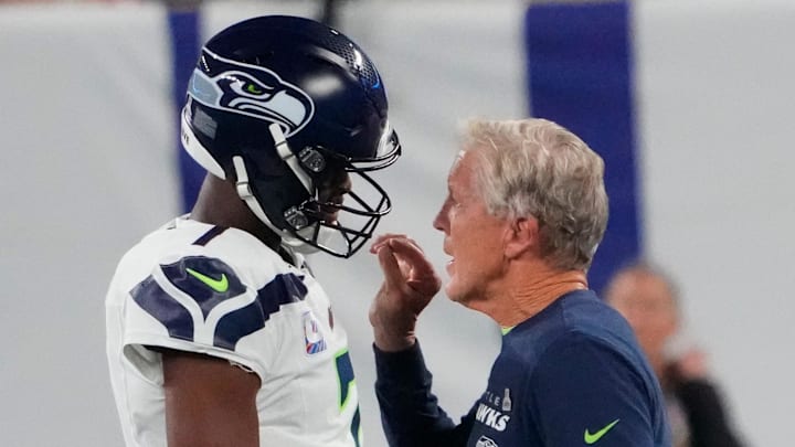 Oct 2, 2023; East Rutherford, New Jersey, USA; Seattle Seahawks head coach Pete Carroll gives instructions to Seattle Seahawks quarterback Geno Smith (7) against the New York Giants at MetLife Stadium. Mandatory Credit: Robert Deutsch-Imagn Images Oct 2, 2023; East Rutherford, New Jersey, USA; Seattle Seahawks head coach Pete Carroll gives instructions to Seattle Seahawks quarterback Geno Smith (7) against the New York Giants at MetLife Stadium. Mandatory Credit: Robert Deutsch-Imagn Images