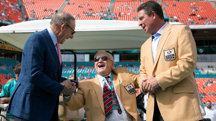 Miami Dolphins owner Stephen Ross with Don Shula and Dan Marino before game at Sun Life Stadium in Miami Gardens, Florida on December 21, 2014. The Dolphins were docked a first-round pick in 2023 and a third-rounder in 2024 and owner Stephen Ross was suspended through mid-October and fined $1.5 million for damage to the integrity of the game, NFL Commissioner Roger Goodell announced Tuesday. The penalties largely surround the DolphinsÃ• flirtation with quarterback Tom Brady Ã‘ not only before