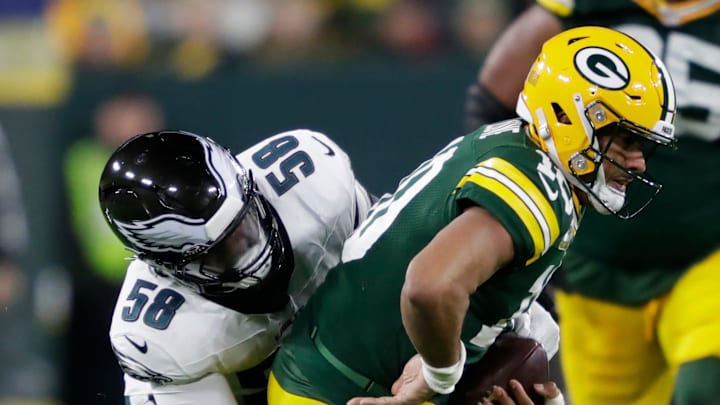 Philadelphia Eagles linebacker Jalyx Hunt (58) sacks Green Bay Packers quarterback Jordan Love (10) in the first quarter during their football game Monday, November 10, 2025, at Lambeau Field in Green Bay, Wisconsin.