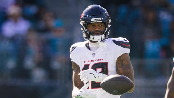 Houston Texans wide receiver Nico Collins (12) celebrates a first down after the catch against the Jacksonville Jaguars in the first quarter at EverBank Stadium. 