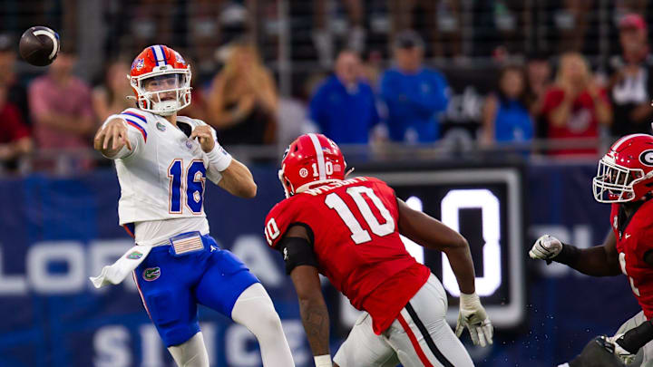 Florida Gators quarterback Aidan Warner (16) throws while being pressured by Georgia Bulldogs linebacker Damon Wilson II (10) during the second half at EverBank Stadium in Jacksonville, FL on Saturday, November 2, 2024. The Bulldogs defeated the Gators 34-20. [Doug Engle/Gainesville Sun]
