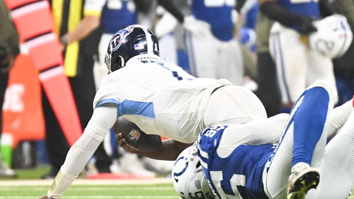 Oct 26, 2025; Indianapolis, Indiana, USA; Indianapolis Colts defensive tackle Adetomiwa Adebawore (95) sacks Tennessee Titans quarterback Cam Ward (1) during the fourth quarter at Lucas Oil Stadium. Mandatory Credit: Robert Goddin-Imagn Images Oct 26, 2025; Indianapolis, Indiana, USA; Indianapolis Colts defensive tackle Adetomiwa Adebawore (95) sacks Tennessee Titans quarterback Cam Ward (1) during the fourth quarter at Lucas Oil Stadium. Mandatory Credit: Robert Goddin-Imagn Images