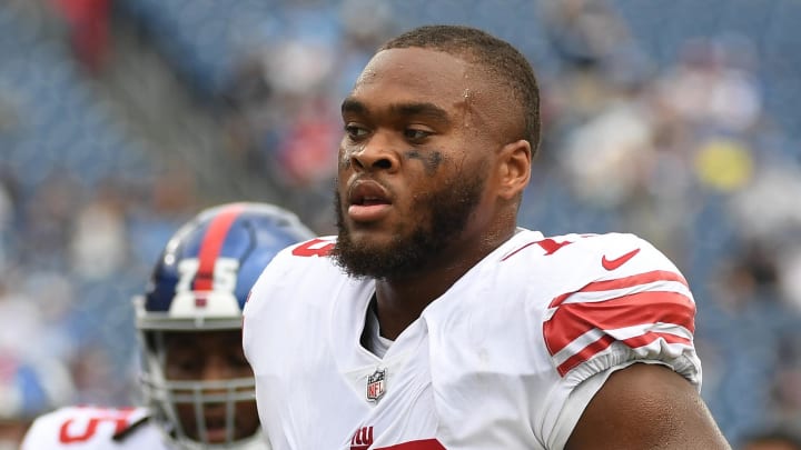 Sep 11, 2022; Nashville, Tennessee, USA; New York Giants offensive tackle Evan Neal (73) leaves the field after warmups before the game against the Tennessee Titans at Nissan Stadium. Mandatory Credit: Christopher Hanewinckel-USA TODAY Sports