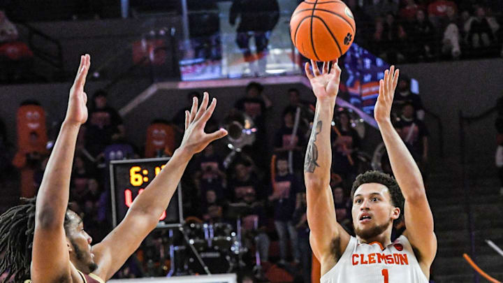 Jan 13, 2024; Clemson, South Carolina, USA; Clemson Tigers guard Chase Hunter (1) shoots the ball