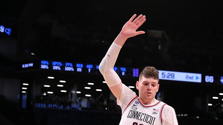 Mar 24, 2024; Brooklyn, NY, USA; Northwestern Wildcats guard Boo Buie (0) dribbles the ball against