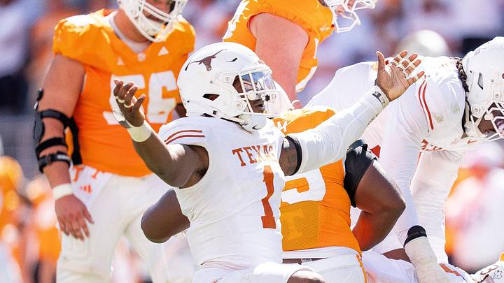 Sep 26, 2026; Knoxville, Tennessee, USA; Texas edge Colin Simmons (1) celebrates after Tennessee quarterback Faizon Brandon (11) is sacked again during a college football game between Tennessee and Texas at Neyland Stadium in Knoxville, Tenn. on Sept. 26, 2026. Mandatory Credit: Brianna Paciorka-USA TODAY Network via Imagn Images