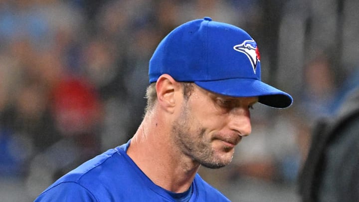 Mar 29, 2025; Toronto, Ontario, CAN;  Toronto Blue Jays pitcher Max Scherzer (31) walks to the dugout after giving up two home run against the Baltimore Orioles in the first inning at Rogers Centre. Mandatory Credit: Dan Hamilton-Imagn Images