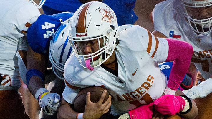 Riverside’s Carlos Rojas III (11) is stopped by Bowie during a game at Bowie High School in El Paso, Texas on Thursday, Oct. 2, 2025. Riverside’s Carlos Rojas III (11) is stopped by Bowie during a game at Bowie High School in El Paso, Texas on Thursday, Oct. 2, 2025.