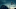 UFO concept. A flying triangle floating above the countryside at night. UFO concept. A flying triangle floating above the countryside at night.