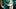 Three surgeons in operating room, mid section Three surgeons in operating room, mid section