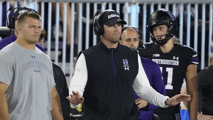 Sep 14, 2024; Evanston, Illinois, USA; Northwestern Wildcats head coach David Braun gestures to his team against the Eastern Illinois Panthers during the first half at Lanny and Sharon Martin Stadium. Mandatory Credit: David Banks-Imagn Images