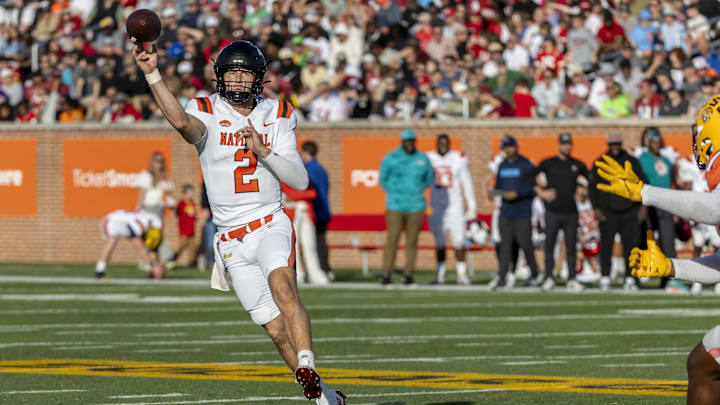 Feb 1, 2025; Mobile, AL, USA; National team quarterback Tyler Shough of Louisville (2) throws the ball during the second half of the 2025 Senior Bowl against the American team at Hancock Whitney Stadium. Feb 1, 2025; Mobile, AL, USA; National team quarterback Tyler Shough of Louisville (2) throws the ball during the second half of the 2025 Senior Bowl against the American team at Hancock Whitney Stadium.