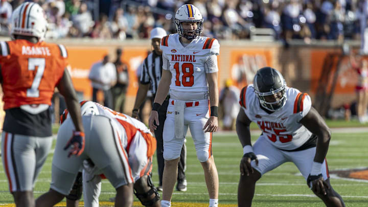 Feb 1, 2025; Mobile, AL, USA; National team quarterback Taylor Elgersma of Laurier (18) sets up for a play against the American team during the second half of the 2025 Senior Bowl at Hancock Whitney Stadium. 